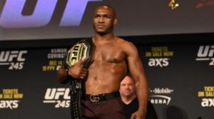 MMA: i 5 migliori pesi welter della storia Kamaru Usman con la cintura dei pesi welter sulla spalla