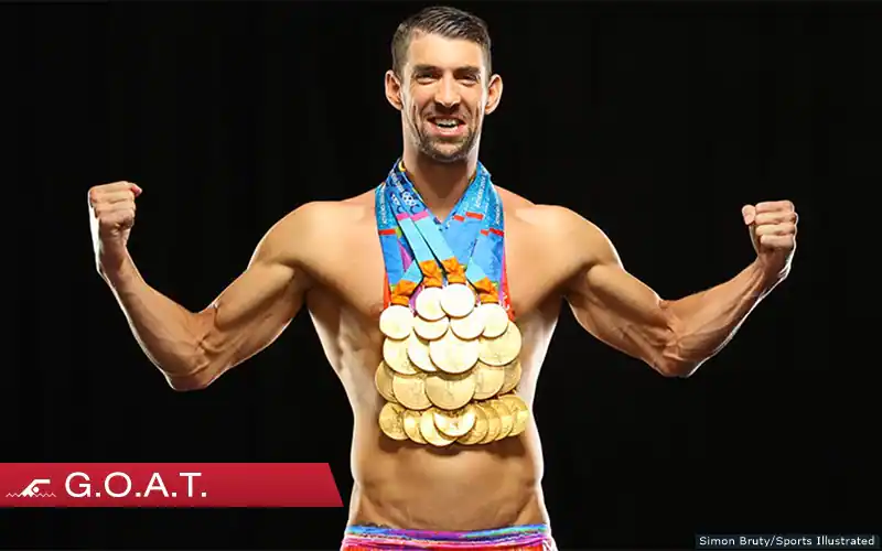 Michael Phelps con tutte le medaglie d'oro conquistate in carriera